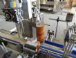 Automatic labeling machine for flat cylindrical bottles and jars Maqmundi