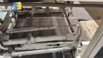Automatic L-sealer with shrink tunnel.