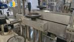 Automatic double head labeling machine for flat bottles Bauch Campos