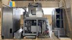Tetra Pak A3 aseptic filling machine with cardboard packer 70 and tray shrink 51.
