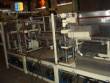 Linear filling machine with thermoforming