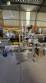 Automatic self-adhesive labeling machine for cylindrical bottles