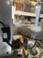 Automatic self-adhesive labeling machine for cylindrical bottles
