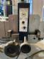 Automatic self-adhesive labeling machine for cylindrical bottles