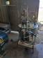 Filling machine for vials and flasks with stopper