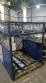 Pick and place product feeder for flowpack transfer cartoning machine