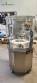 Complete filling line with Tecman Nelpas Tecnoenvase Tudela bottle filling, labeling, capping, and positioning machines for cosmetic liquids.