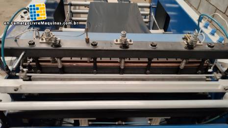 Complete line for manufacturing plastic bags and sacks