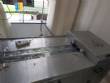 Automatic thermoforming machine with two lanes