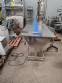 Stainless steel conveyor table with belt for accumulation assembly