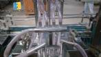 Linear 4 nozzle filling machine Erli