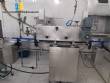 Line for brine filling manual product insertion and automatic capping