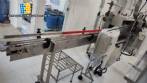 Line for brine filling manual product insertion and automatic capping