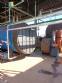 Wood-fired flame tube boiler for steam generation