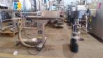 Filling machine with 2 nozzles for liquids and pilfer cap screwer