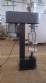 Filling machine with 2 nozzles for liquids and pilfer cap screwer