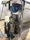 Stainless steel meat grinder with size 98 opening.