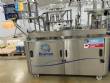 Automatic stainless steel filling machine for a�a� jars, Bramak ice cream