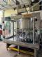 Packaging line with IMSB bung capper, Maqmundi labeler and accumulator table