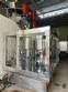 Packaging line with IMSB bung capper, Maqmundi labeler and accumulator table