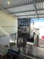 Packaging line with IMSB bung capper, Maqmundi labeler and accumulator table