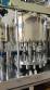 Packaging line with IMSB bung capper, Maqmundi labeler and accumulator table