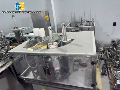 Automatic rotary dosing filling machine with sealer for Delgo cups, 3500 cups per hour.
