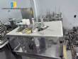 Automatic rotary dosing filling machine with sealer for Delgo cups, 3500 cups per hour.