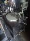 Erli rotary liquid filling machine with 4 pistons, 14,400 units per hour.