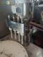 Erli rotary liquid filling machine with 4 pistons, 14,400 units per hour.