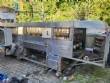 Filling line for 10 and 20 liter gallon jugs with filling machine and rinser/washer.