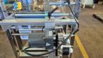 Dosing and packaging machine for granular and powdered products