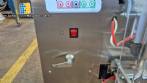 Dosing and packaging machine for granular and powdered products