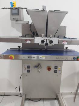 Automatic one-shot drip tray for chocolates