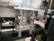 Automatic labeler for flat bottles