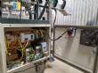 Automatic labeler for flat bottles
