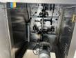 Automatic volumetric dosing packaging machine for powder products.