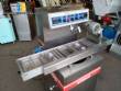Tempering machine with cover plate coupled to Sidmaq