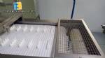 Stuffing machine for garlic bread