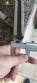 Bottle and jar screwing machine with automatic cap feeding system