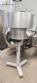 Bottle and jar screwing machine with automatic cap feeding system