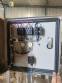 Bottle and jar screwing machine with automatic cap feeding system
