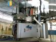 Krones automatic rotary label applicator for paper labels.