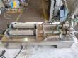 Stainless steel benchtop filling machine for liquids and viscous products