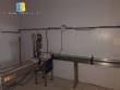 Linear filling machine with 14 nozzles with rinser and screw capper