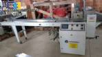 Varied flow pack wrapping machines
