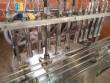 Vacuum filling machine with 12 nozzles Erli
