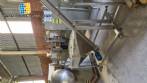 Inclined screw conveyor with stainless steel silo