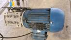 Inclined screw conveyor with stainless steel silo