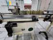Labeling machine for cylindrical bottles